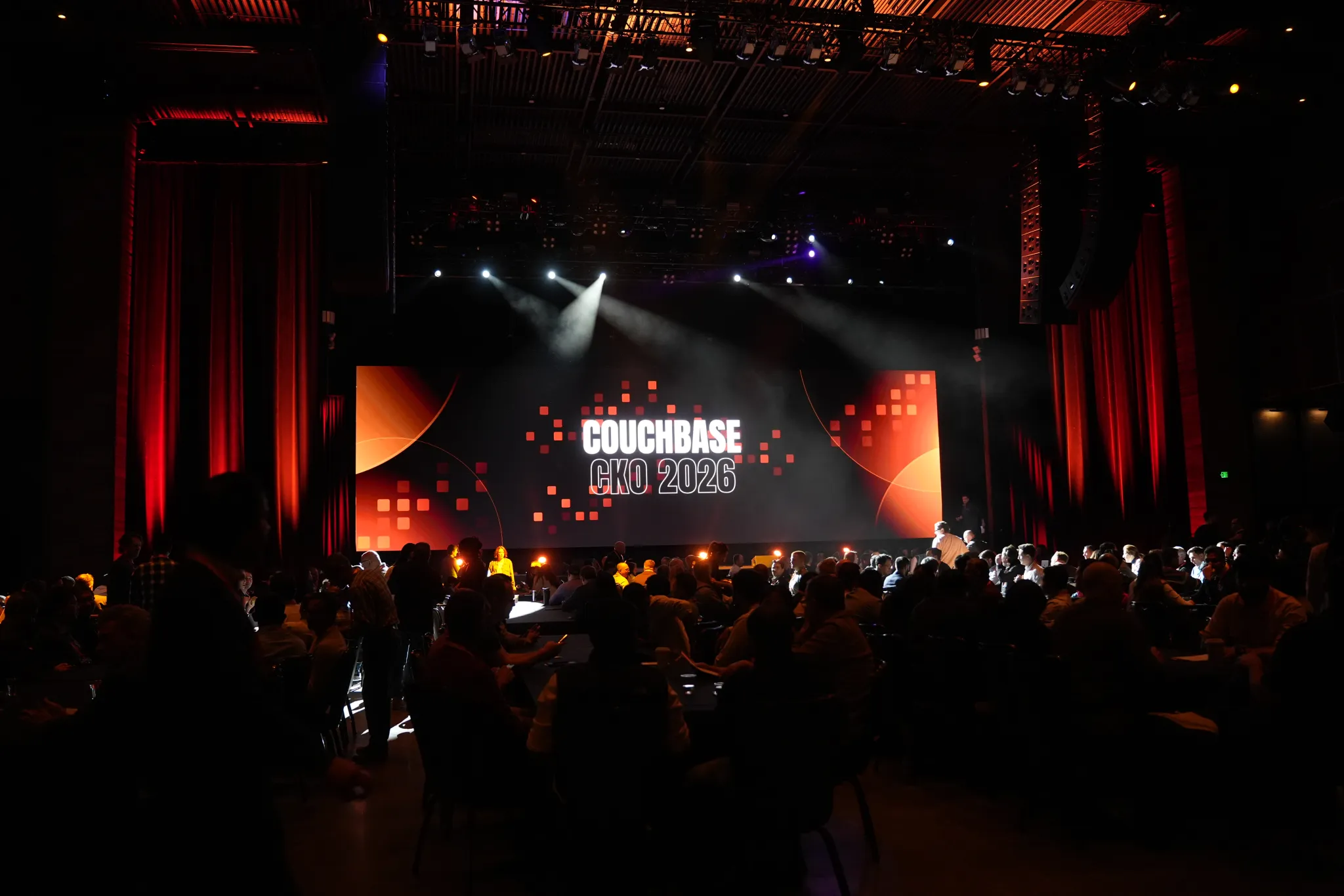 Couchbase Company Kickoff team capturing sales play needs on a flip chart