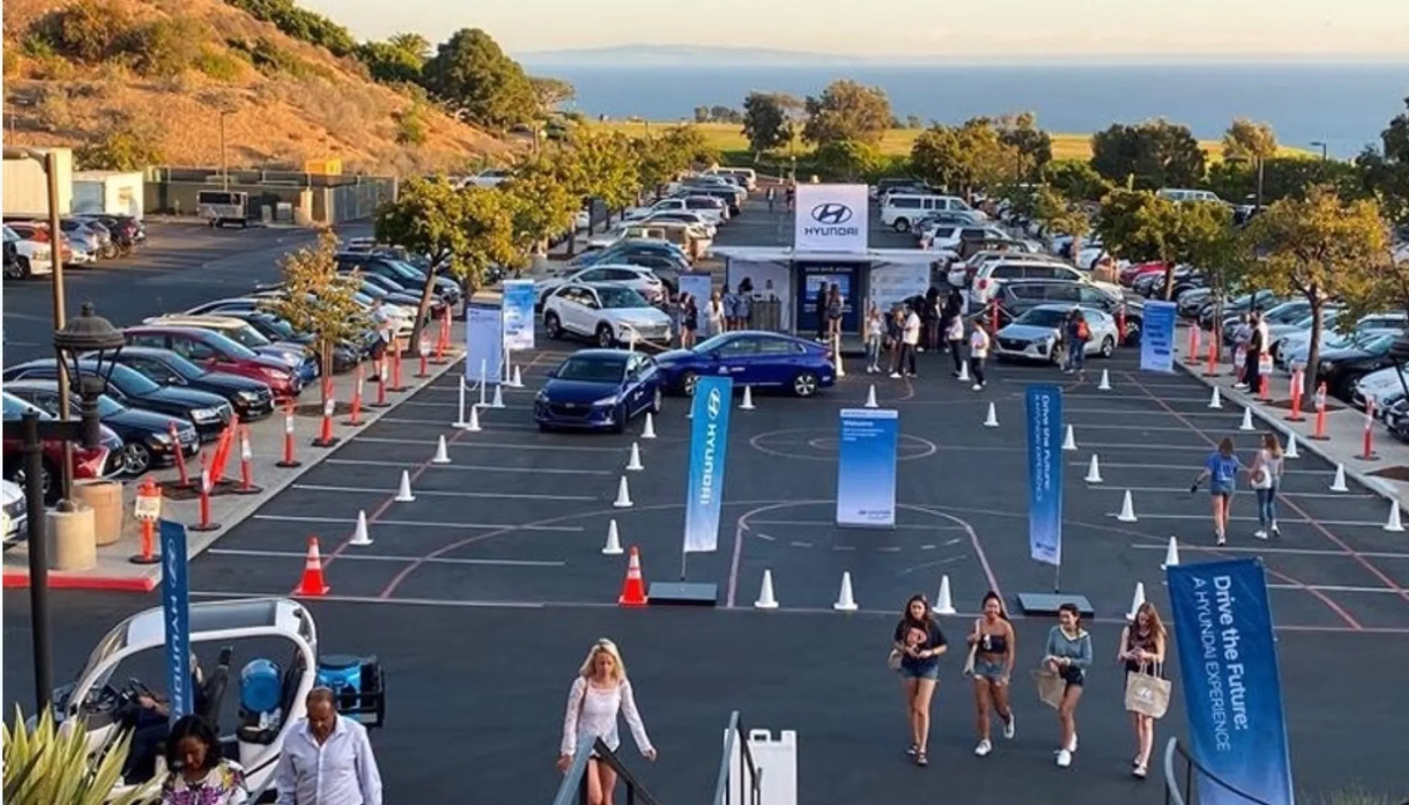 Aerial view of the Hyundai Drive the Future ride-and-drive activation course at a California university campus at sunset